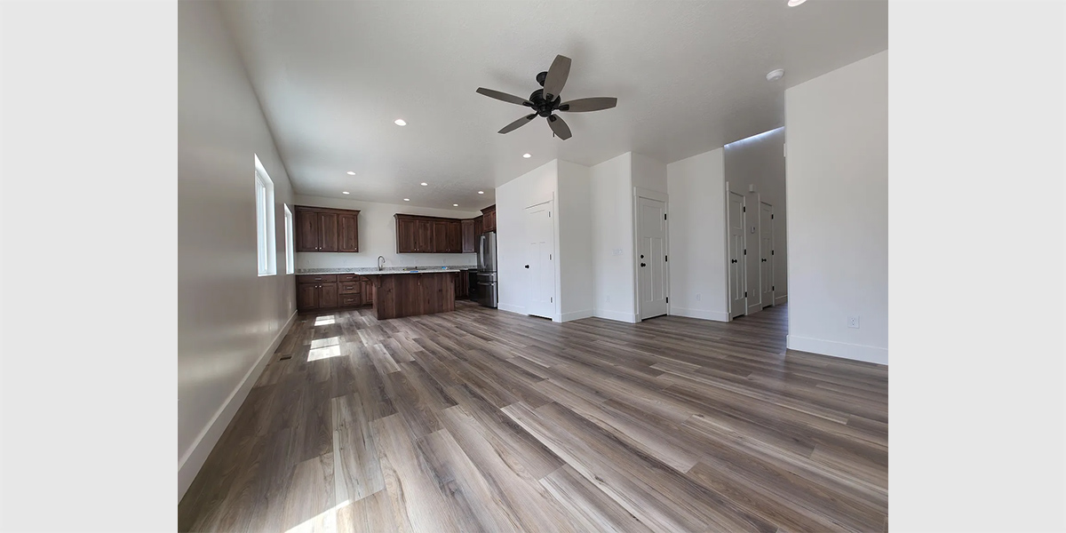 House rear elevation view for D-723 Basement duplex house plan with two car garage D-723